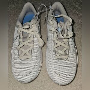 NWOT. Nike Legend Women's White and Gray Athletic Shoes. Ships with no box.